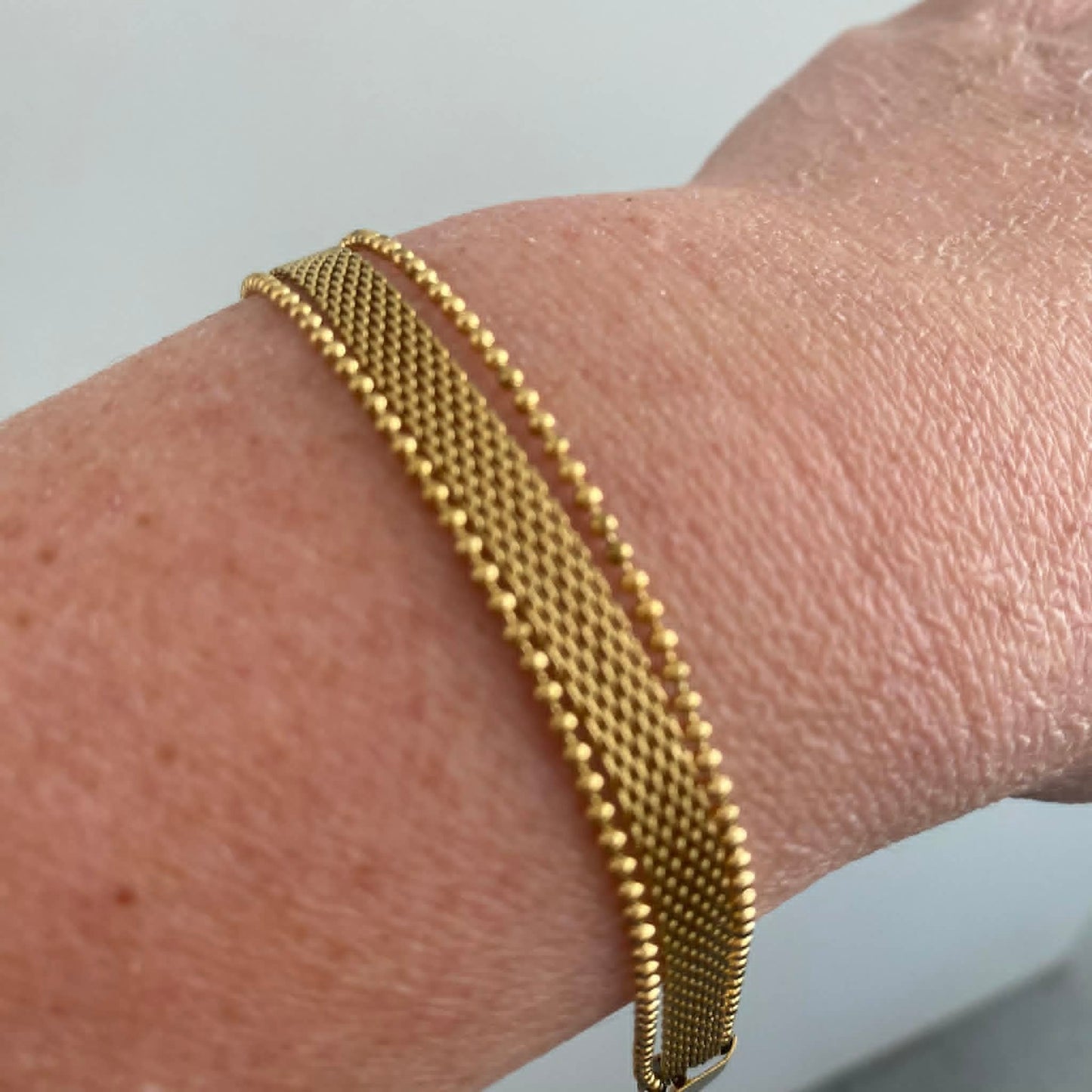 Wauw: armbandje goud in stainless steel - 1 breed en 2 smalle