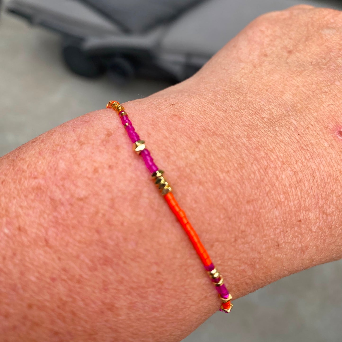 Armbandje op elastiek Miyuki kralen - oranje en fuchsia