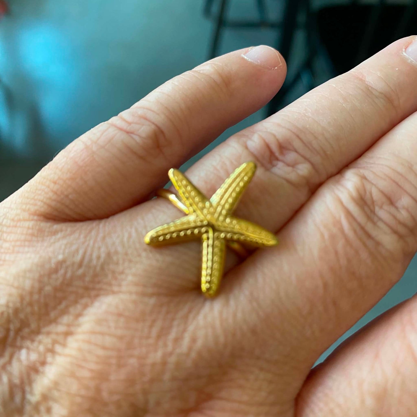 Kannai: Verstelbare zeester ring in stainless steel - goud