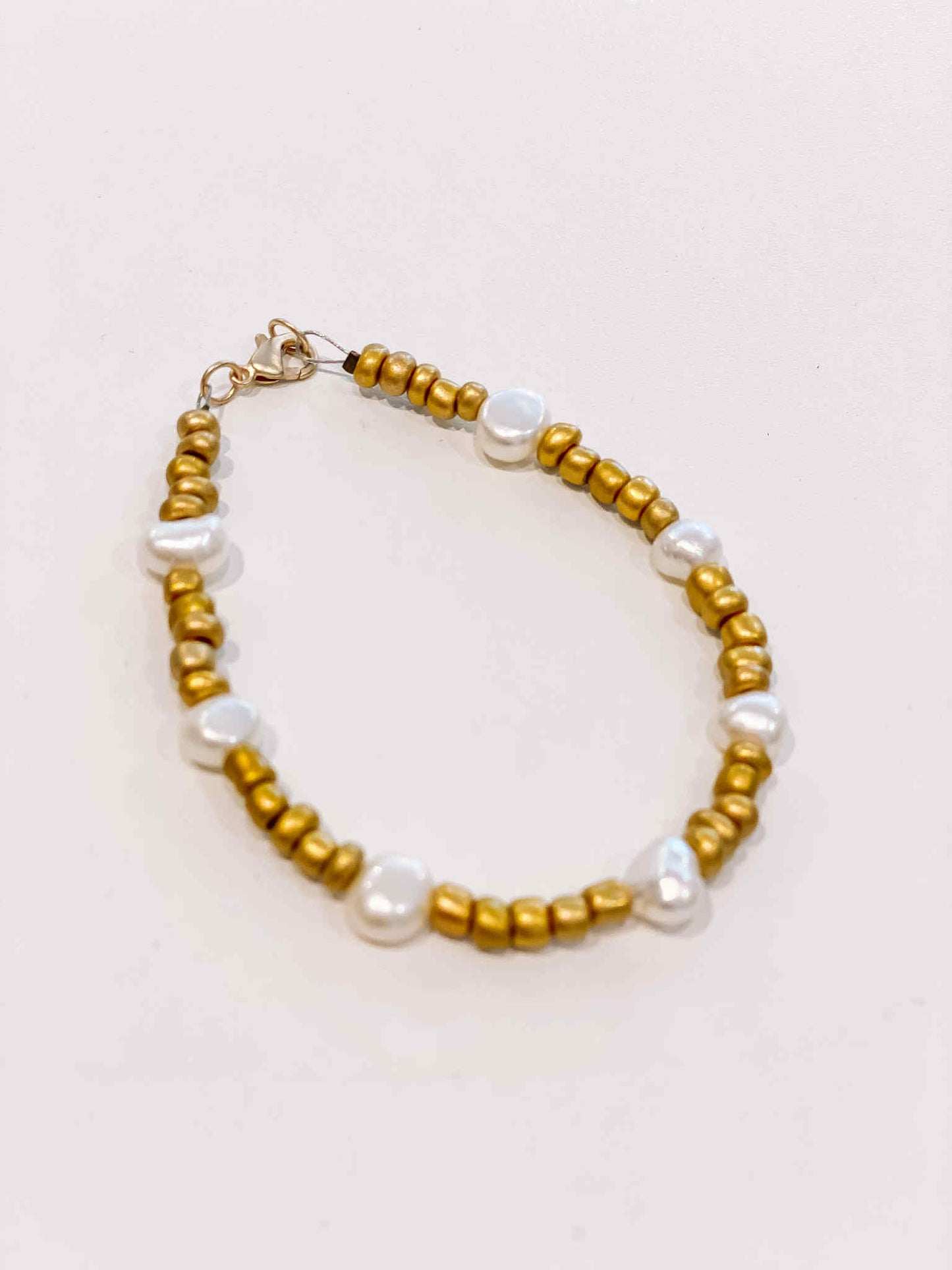 Le marché sucré: Armband goud + parelmoer