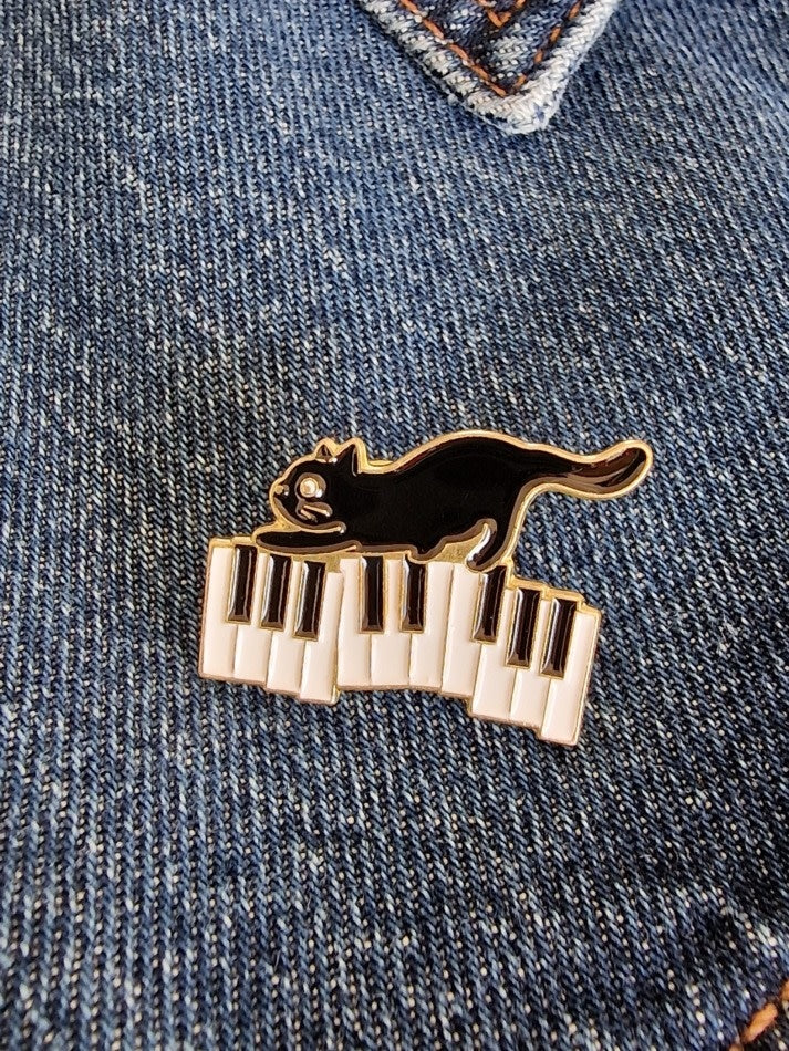 Le marché sucré:  Pin -  kat op piano