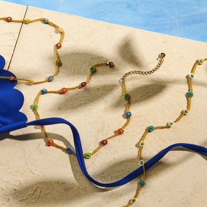 Biba: ketting pareltjes en bloemetje