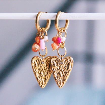 Bazou: oorbellen - Brede RVS ring met ketting, hart en cluster - roze/oranje