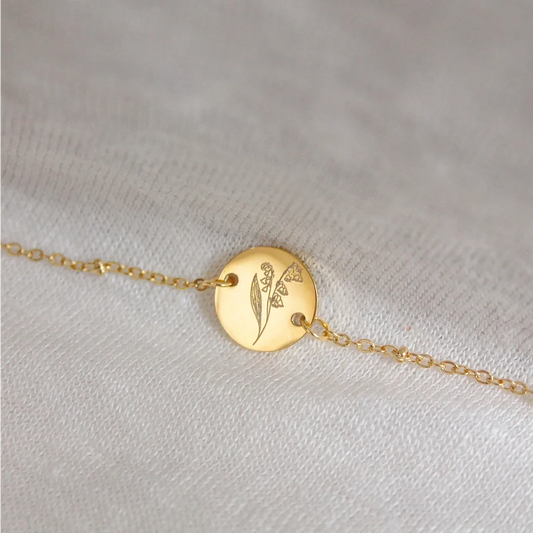 Gouden geboortebloem armband • een persoonlijk cadeau met betekenis