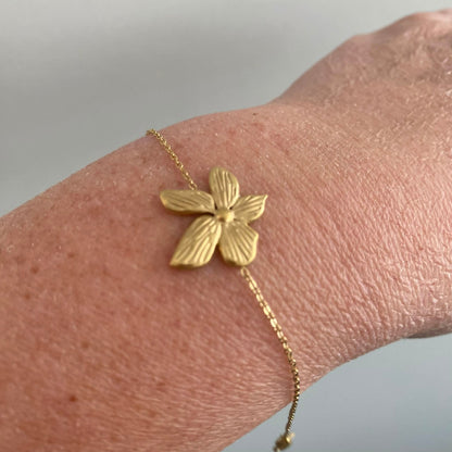 Wauw: armbandje goud in stainless steel - bloem