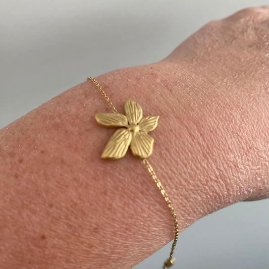 Wauw: armbandje goud in stainless steel - bloem