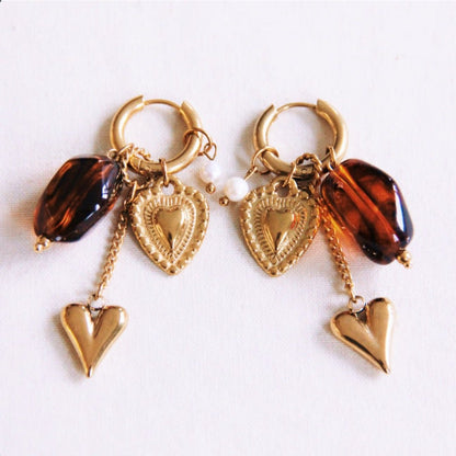 Bazou: oorbellen - Brede RVS ring met ketting, hart en cluster - roze/oranje