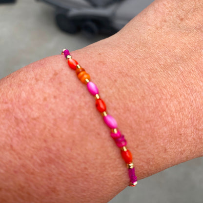 Armbandje op elastiek Miyuki kralen - oranje en fuchsia